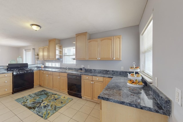 kitchen featuring black appliances, light brown cabinetry, sink, kitchen peninsula, and light tile patterned floors