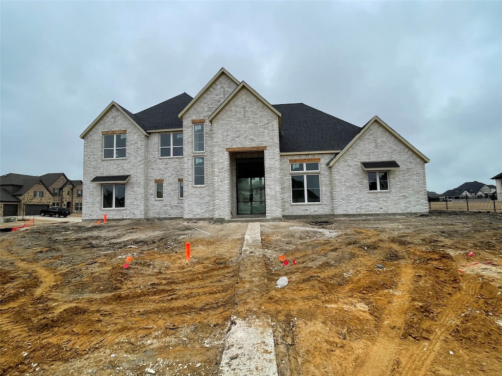 view of french country inspired facade