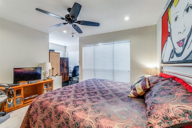 carpeted bedroom featuring ceiling fan