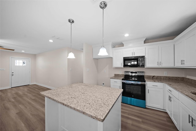 kitchen featuring white cabinetry, a kitchen island, hanging light fixtures, and stainless steel range with electric stovetop