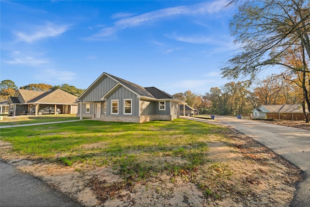 view of front of home with a front yard