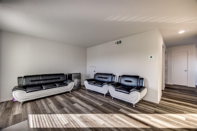 living room featuring dark hardwood / wood-style floors