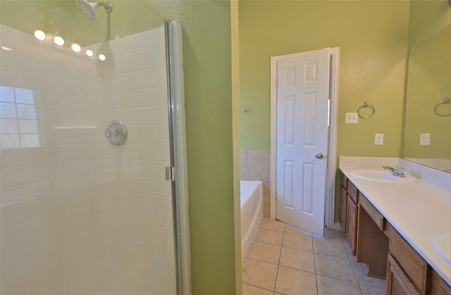 bathroom featuring separate shower and tub, tile patterned floors, and vanity