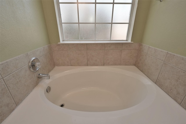 bathroom featuring a bathtub