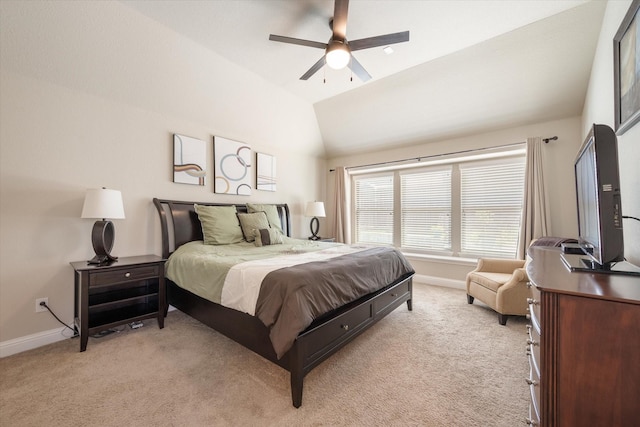 carpeted bedroom featuring vaulted ceiling and ceiling fan