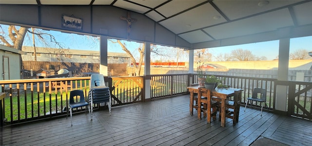 wooden terrace featuring a gazebo