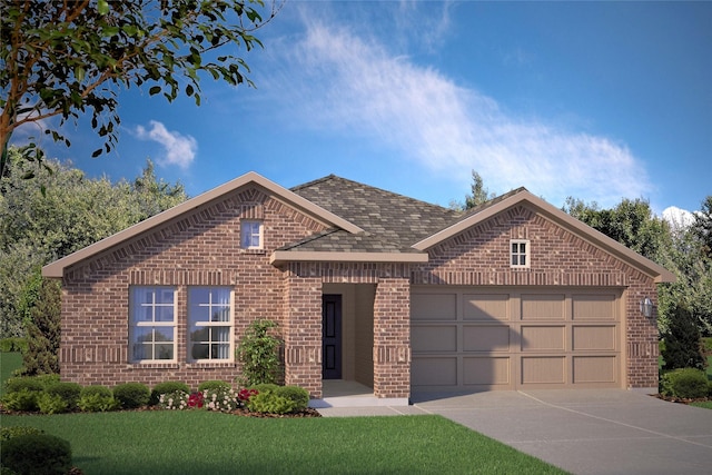 view of front of house with a garage and a front yard