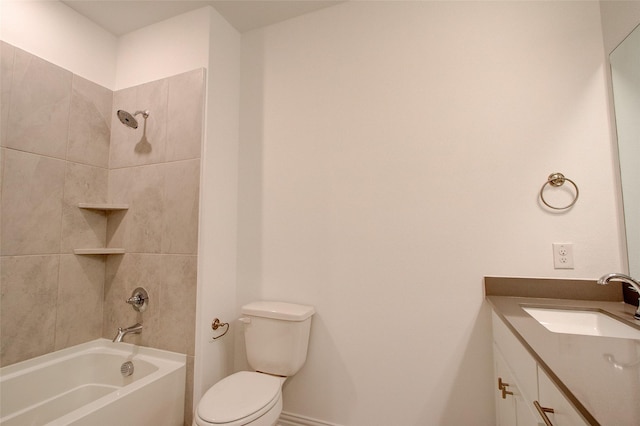 full bathroom featuring vanity, toilet, and tiled shower / bath