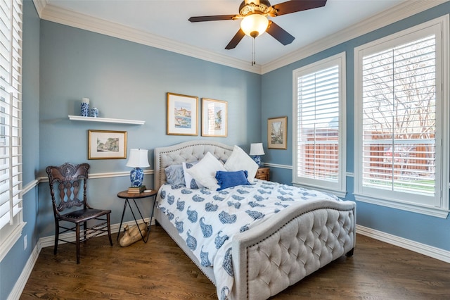 bedroom featuring ceiling fan, crown molding, and dark wood-type flooring