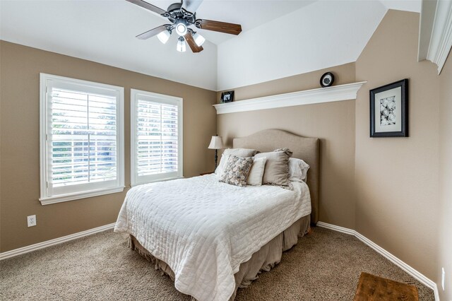 bedroom featuring carpet flooring, ceiling fan, and vaulted ceiling