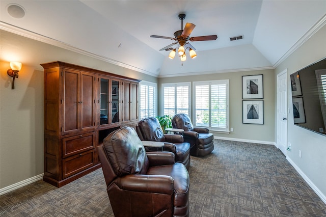 carpeted living room with ceiling fan, lofted ceiling, and ornamental molding