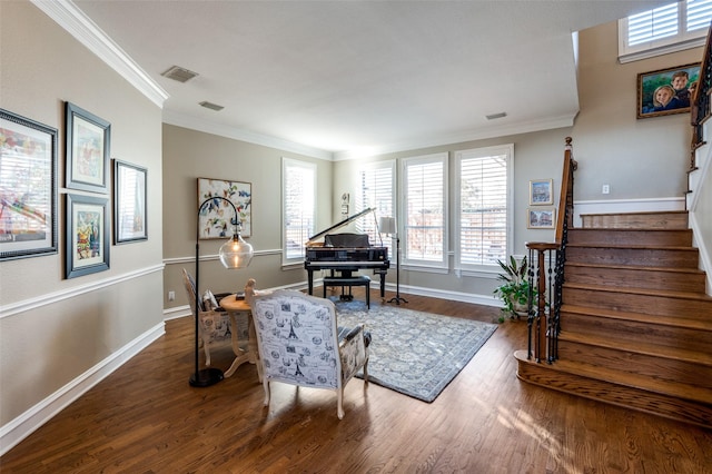 living area with crown molding, plenty of natural light, and dark wood-type flooring