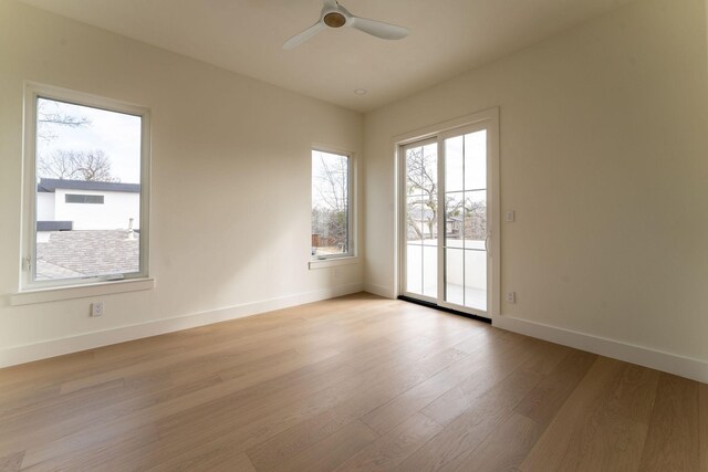 interior space featuring gray cabinetry, sink, and light hardwood / wood-style floors