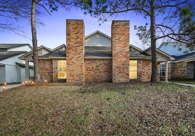 view of home's exterior featuring a yard