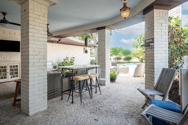 view of patio / terrace featuring a swimming pool