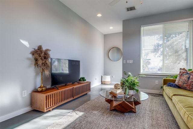 living room featuring ceiling fan