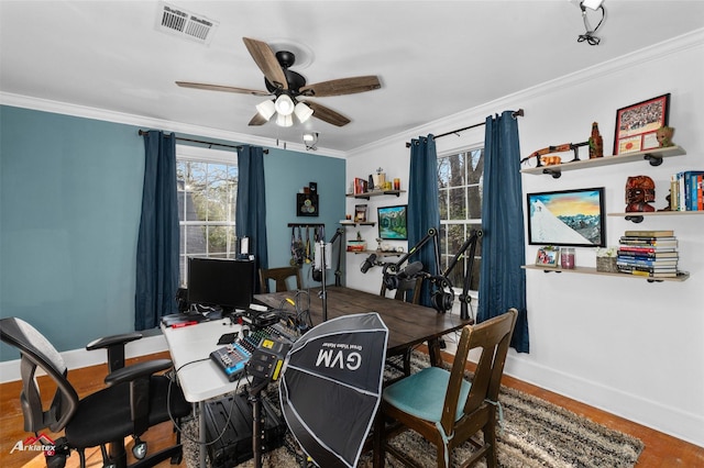 dining area featuring hardwood / wood-style floors, ceiling fan, and ornamental molding