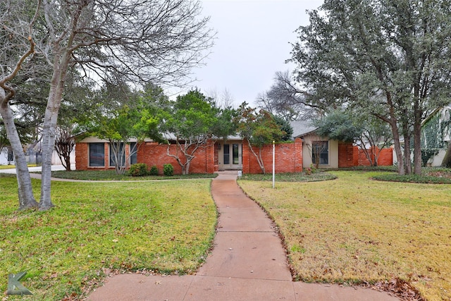 view of front of home with a front lawn