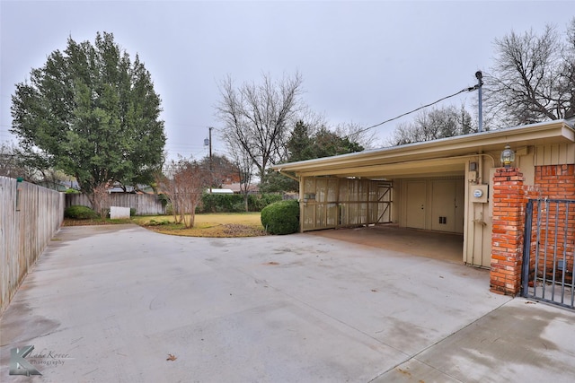 view of parking featuring a carport