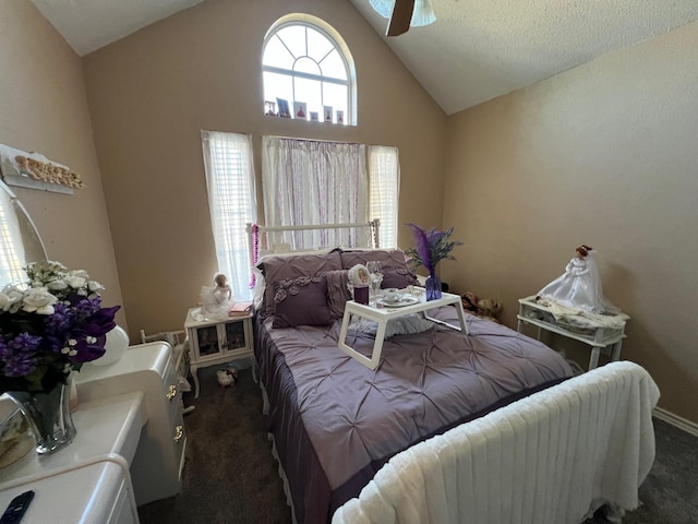 carpeted bedroom featuring lofted ceiling and ceiling fan