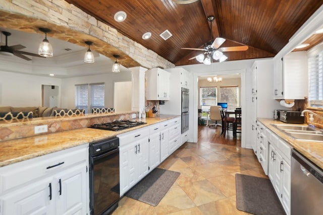 kitchen featuring pendant lighting, sink, white cabinets, stainless steel appliances, and wooden ceiling