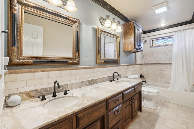 full bathroom featuring tile patterned floors, toilet, shower / tub combo, tile walls, and vanity