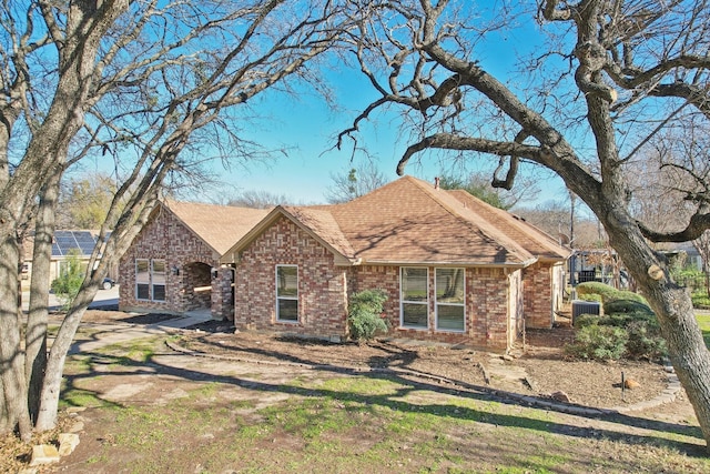 view of front of property with cooling unit