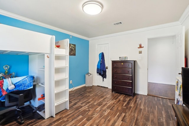 bedroom featuring crown molding and dark wood-type flooring