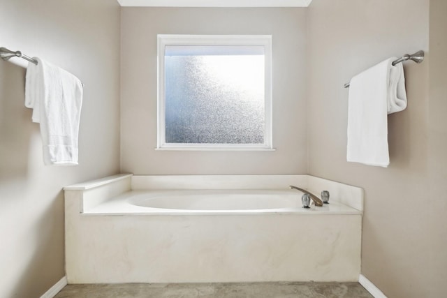 bathroom featuring a tub