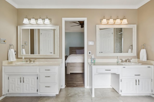 bathroom featuring vanity, ornamental molding, and ceiling fan