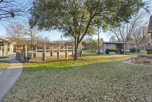 view of yard featuring a deck