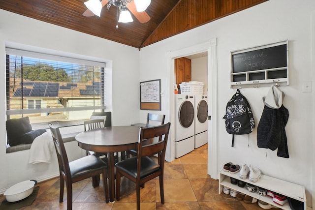 dining area featuring vaulted ceiling, washer and dryer, wooden ceiling, and ceiling fan