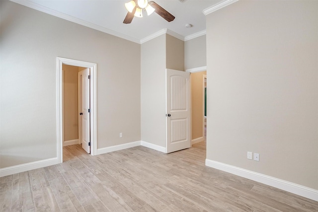 unfurnished bedroom featuring ceiling fan, light wood-type flooring, and ornamental molding