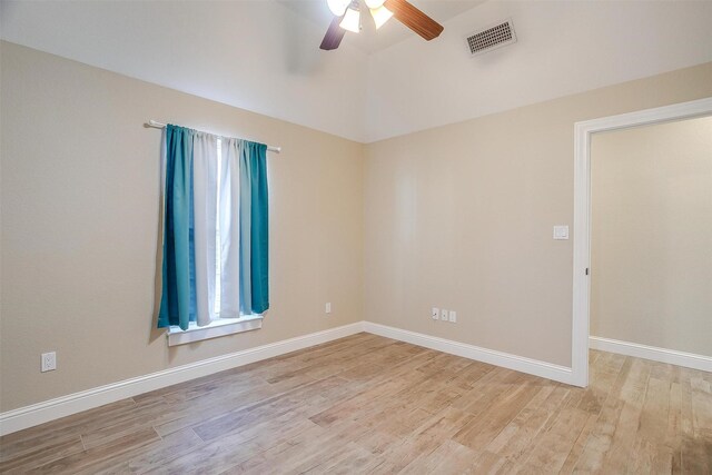 spare room with light hardwood / wood-style flooring and ceiling fan