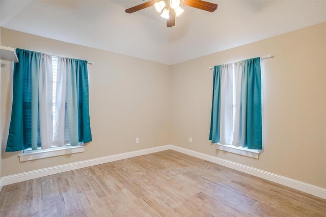 unfurnished room with ceiling fan and light wood-type flooring