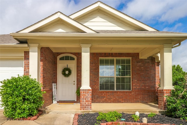 doorway to property with a porch