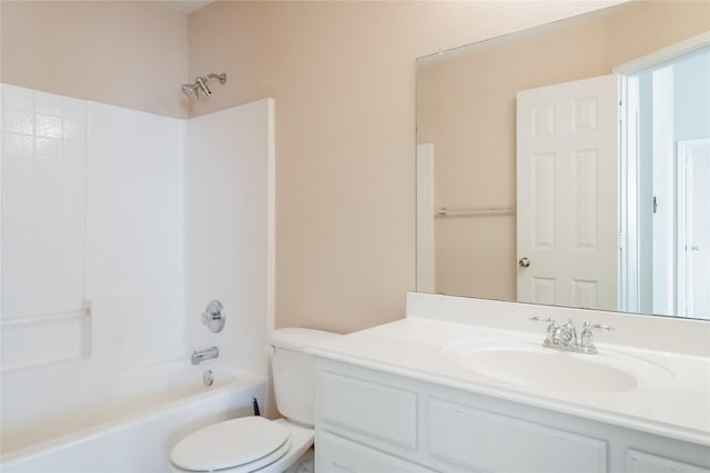 full bathroom featuring shower / bathing tub combination, vanity, and toilet