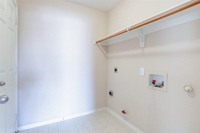 laundry area with gas dryer hookup, hookup for an electric dryer, and washer hookup