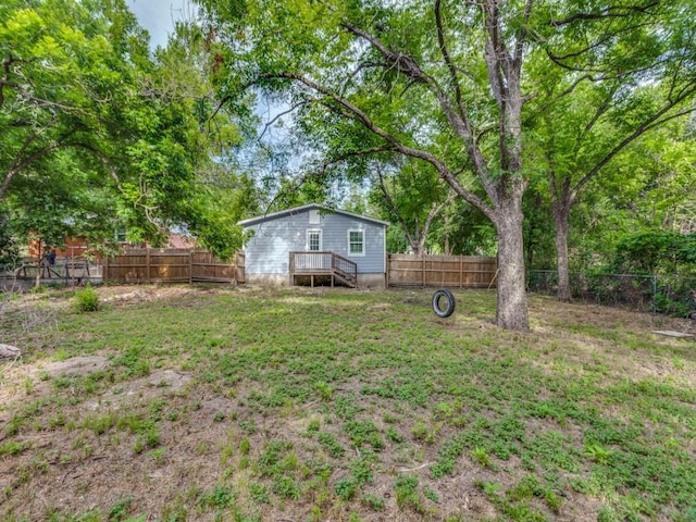 view of yard featuring a deck