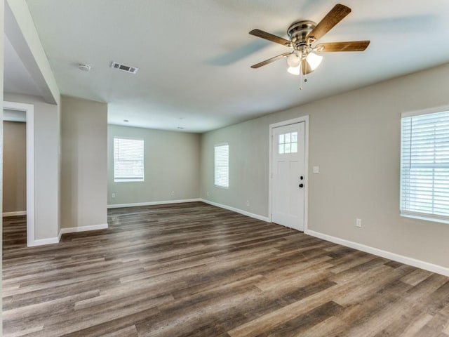 entrance foyer featuring ceiling fan and dark hardwood / wood-style flooring