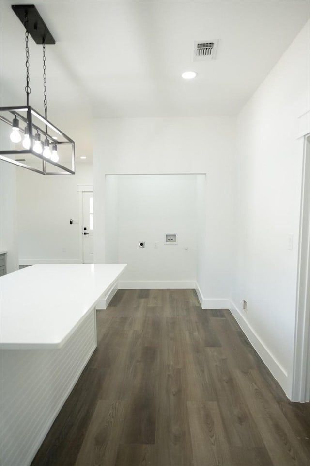 washroom with dark hardwood / wood-style flooring