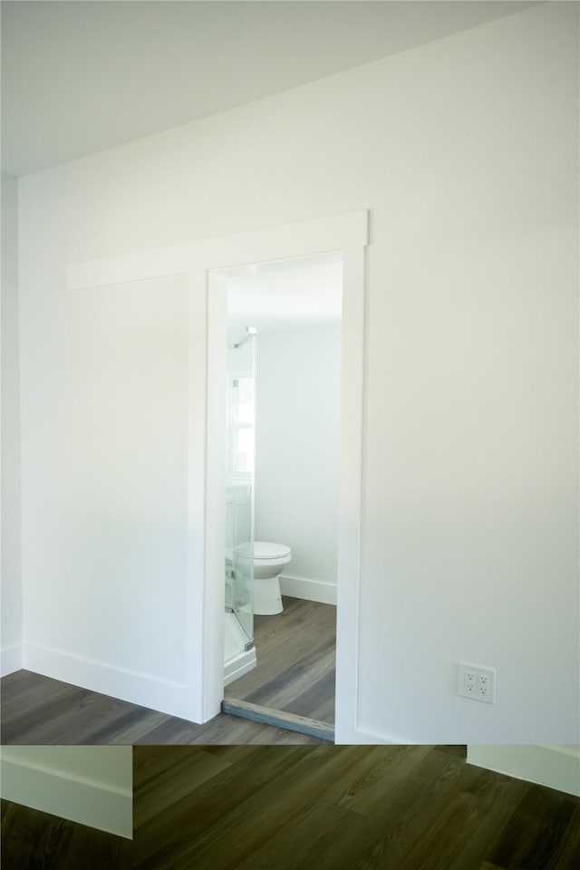 corridor featuring hardwood / wood-style flooring