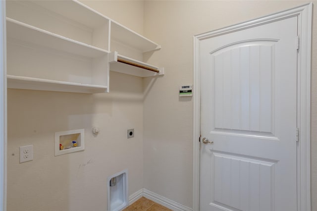 washroom with electric dryer hookup, gas dryer hookup, hookup for a washing machine, and light tile patterned floors