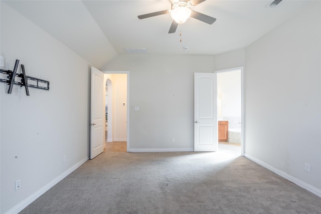 unfurnished bedroom featuring light colored carpet and ceiling fan