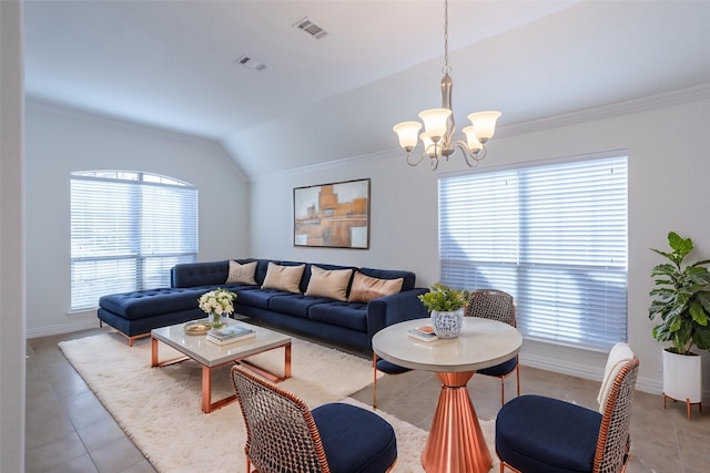 living room with tile patterned floors, ornamental molding, vaulted ceiling, and a notable chandelier