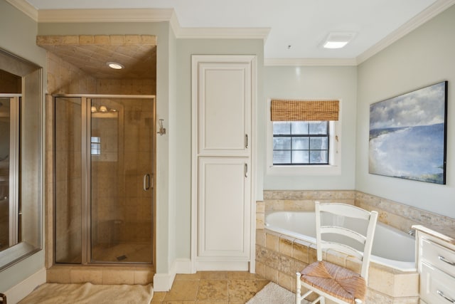 bathroom with ornamental molding and shower with separate bathtub