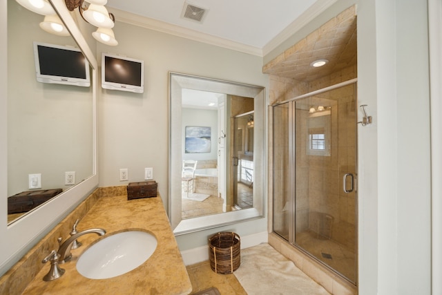 bathroom featuring a chandelier, ornamental molding, a shower with shower door, and vanity