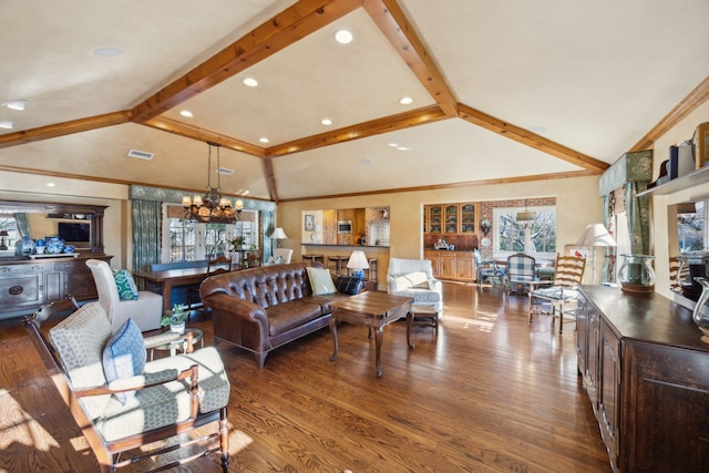 living room featuring vaulted ceiling with beams, hardwood / wood-style floors, ornamental molding, and a notable chandelier