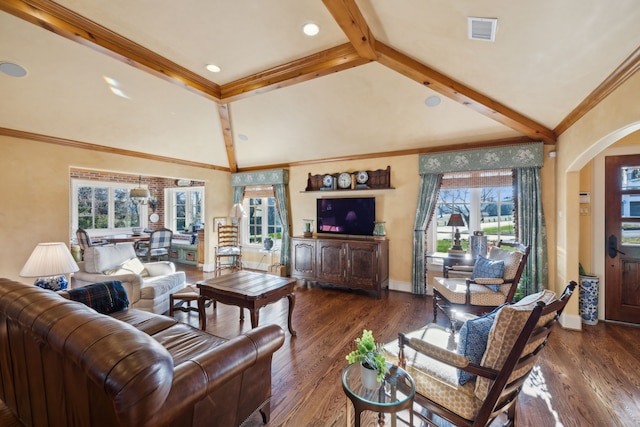 living room with vaulted ceiling with beams, a wealth of natural light, and dark hardwood / wood-style flooring