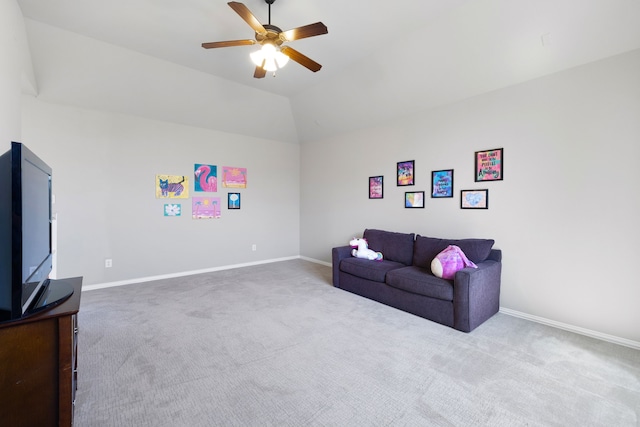 carpeted living room featuring ceiling fan and lofted ceiling